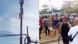 Cubano protesta desde lo alto de  una torre de energía contra apagones